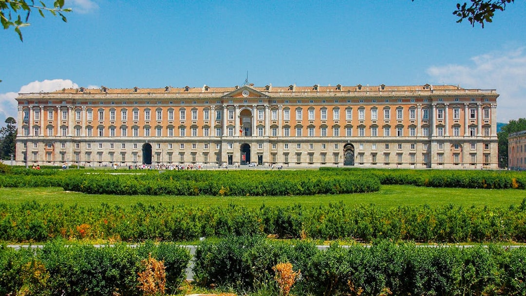 Royal Palace of Caserta facade with gardens, Italy.