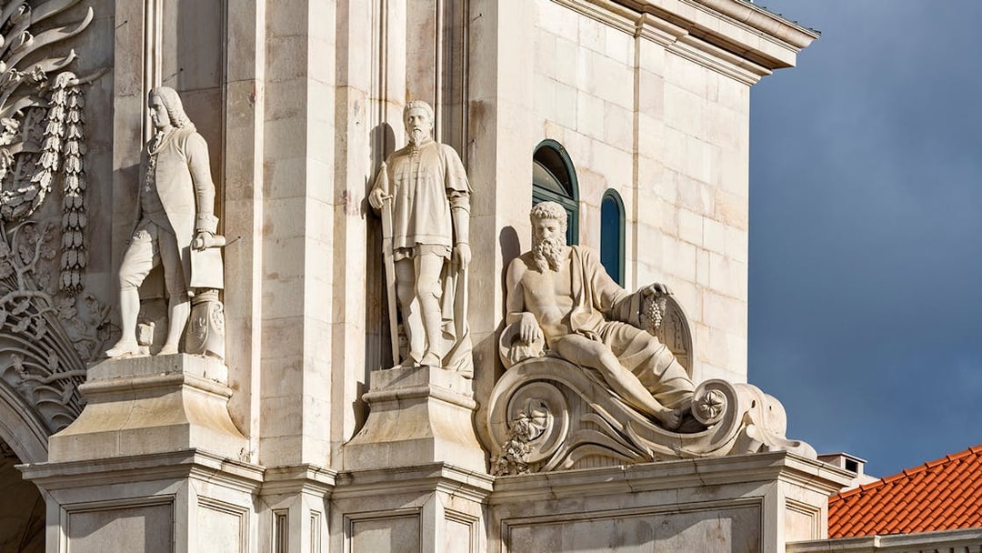 Statues on Rua Augusta Arch in Lisbon, Portugal.