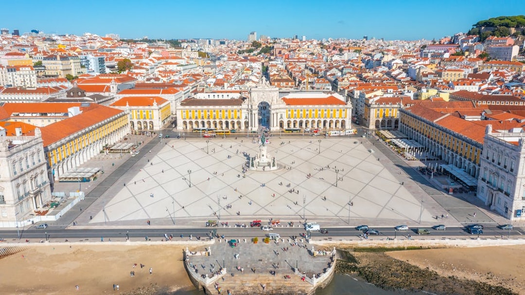 Aerial view of Rua Augusta Arch and Praça do Comércio in Lisbon, Portugal.