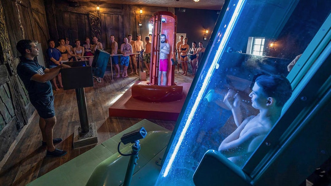 Visitors at Rulantica water park preparing for a water slide experience.