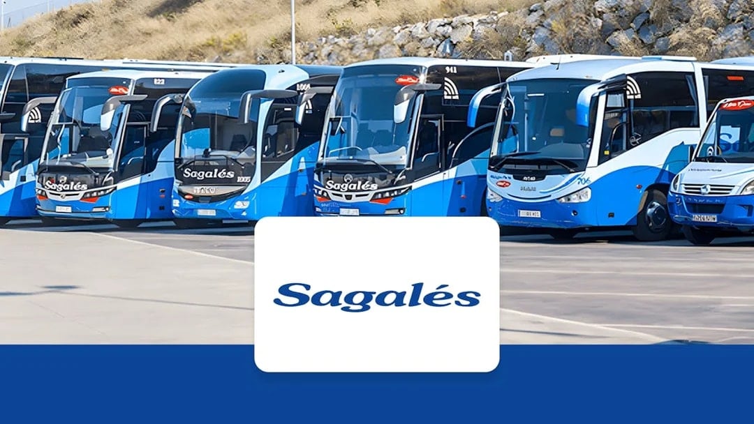 Buses at Girona Airport for transfer to Barcelona City Center.