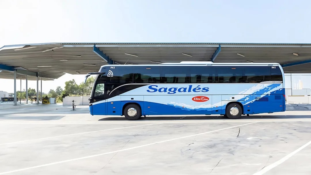 Bus at Girona Airport for transfer to Barcelona City Center.