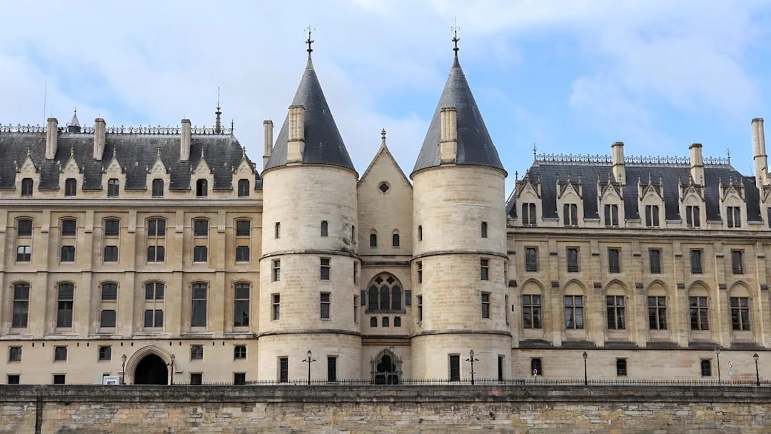 La Conciergerie facade with towers, Paris.