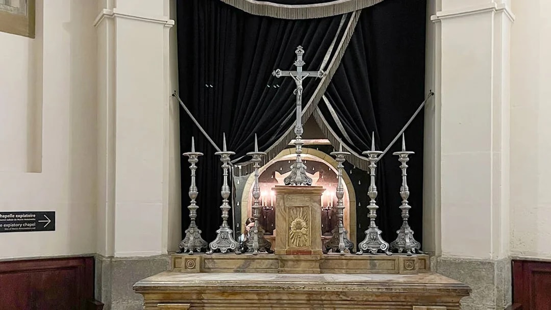 Altar with silver candlesticks and cross in Sainte Chapelle, Paris.