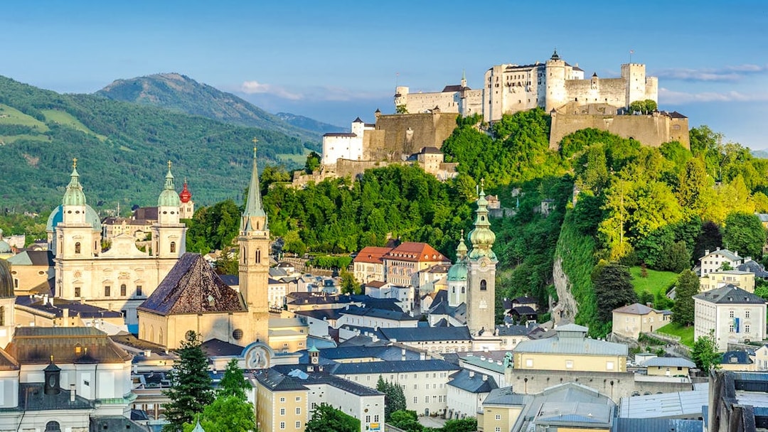 Hohensalzburg Fortress overlooking Salzburg cityscape, Austria.
