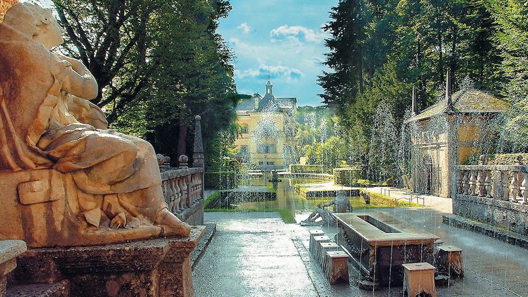 Hellbrunn Palace gardens with fountains in Salzburg, Austria, accessible with Salzburg Card.