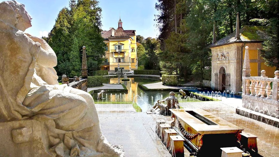 Hellbrunn Palace with water-trick fountains and statues in Salzburg.
