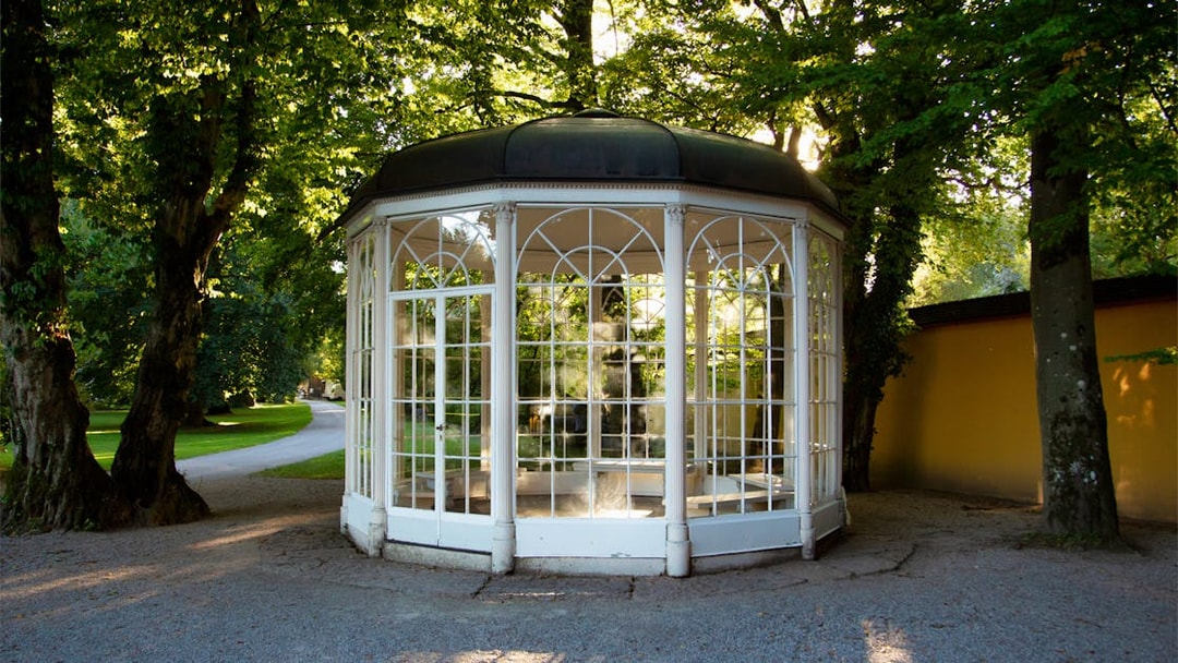 Gazebo from The Sound of Music in Salzburg, surrounded by trees.