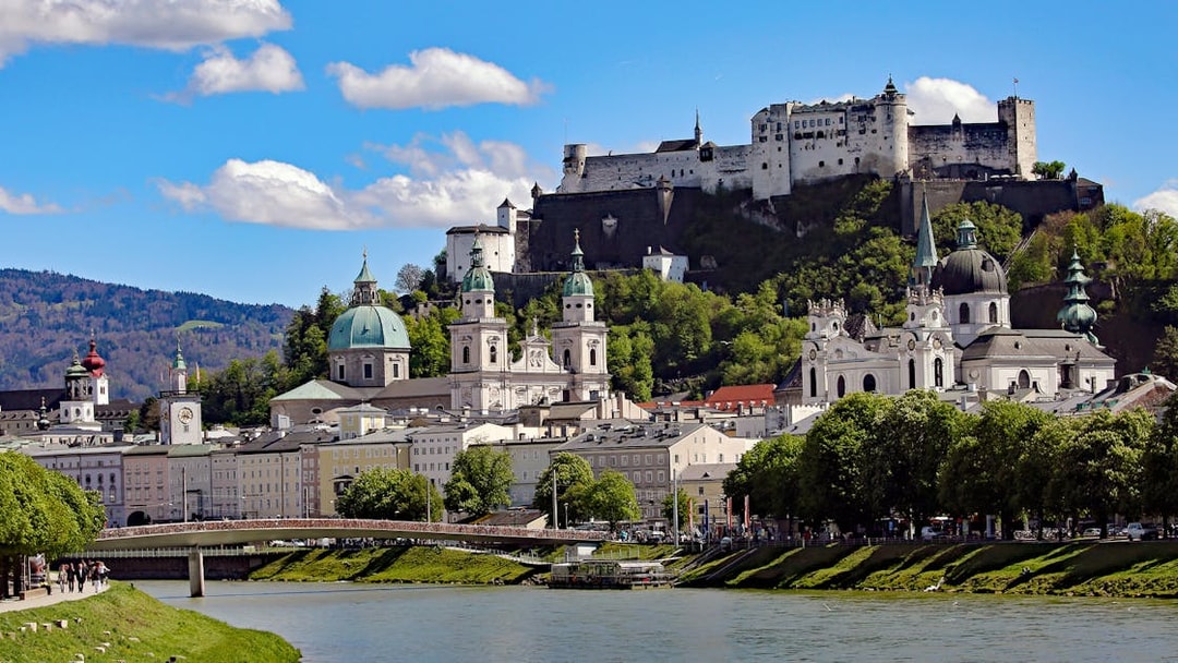 Salzburg skyline with Hohensalzburg Fortress and Salzach River, Austria.