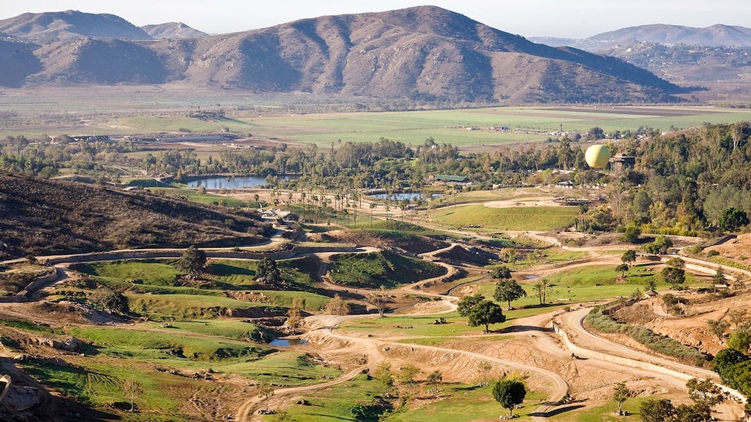 San Diego Zoo Safari Park landscape with Africa Tram paths and distant mountains.