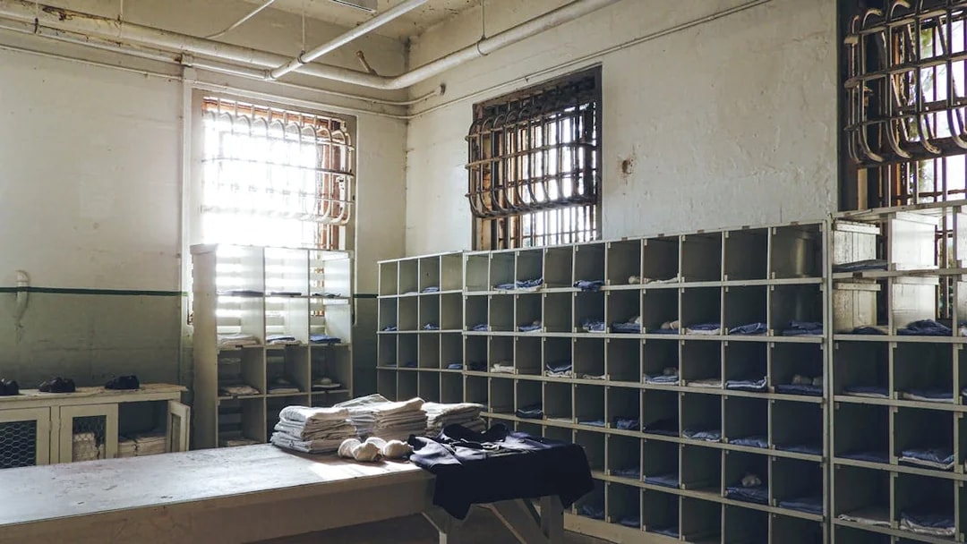 Alcatraz prison laundry room with shelves and barred windows in San Francisco.