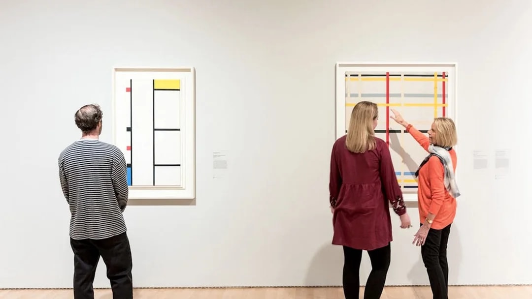 Visitors viewing abstract art at San Francisco Museum of Modern Art.