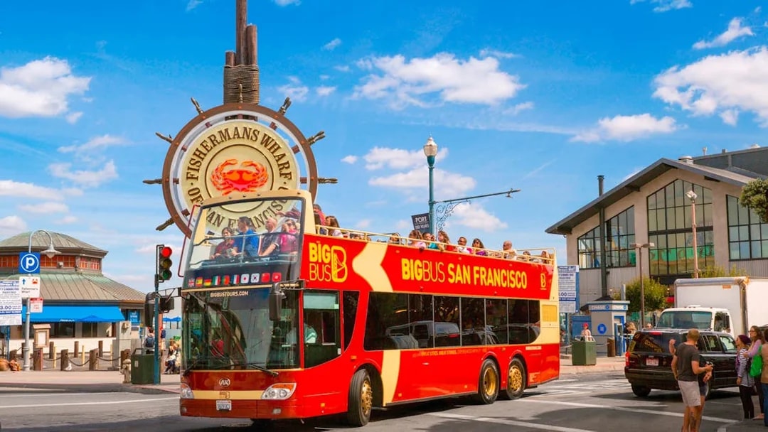 Open-top tour bus at Fisherman's Wharf, San Francisco.