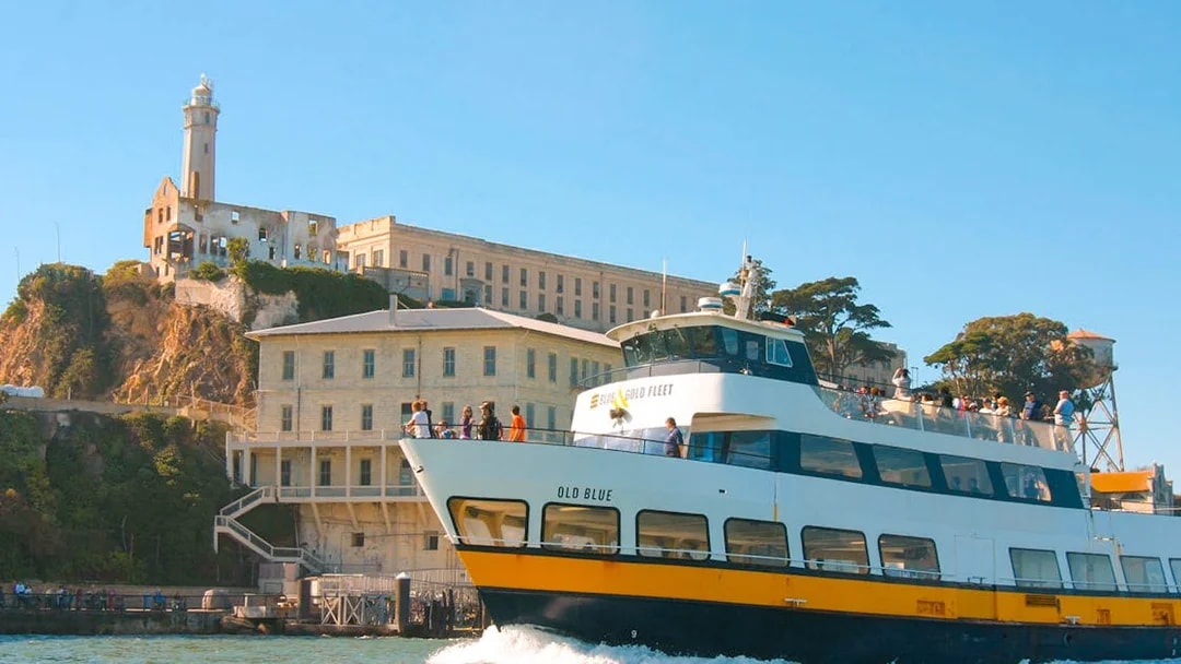 Ferry approaching Alcatraz Island in San Francisco Bay, part of the San Francisco Explorer Pass.