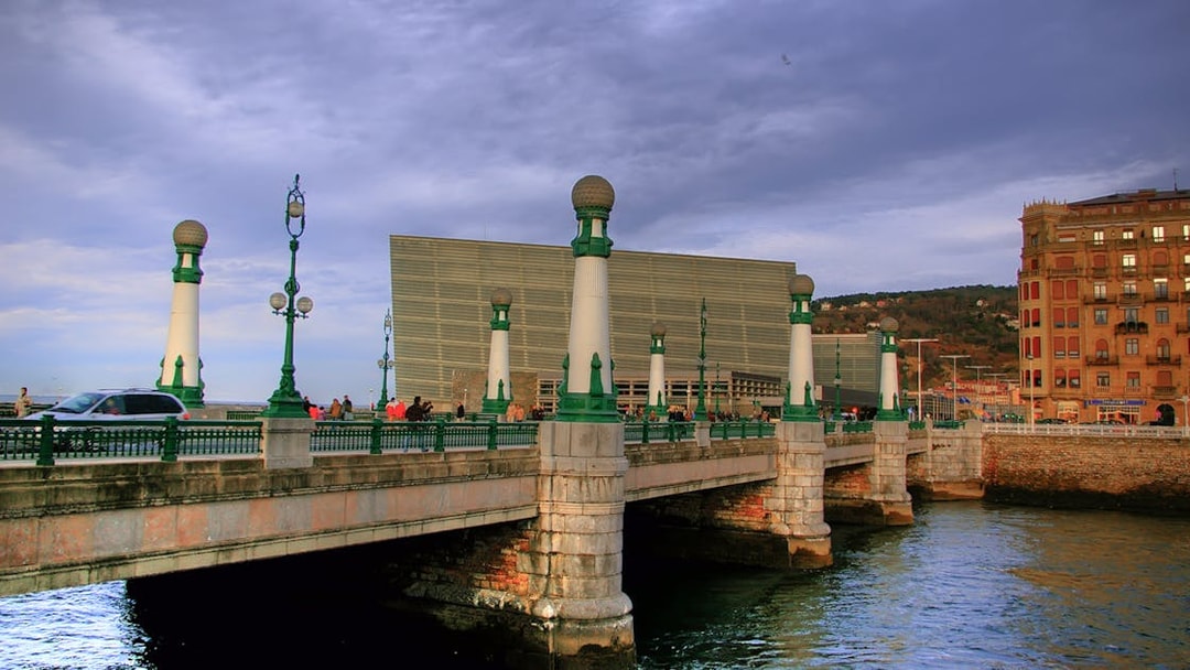 San Sebastian bridge with Kursaal building in background during guided walking tour.