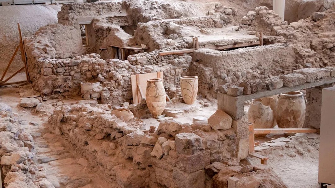 Akrotiri Archaeological Site ruins with ancient pottery in Santorini, Greece.