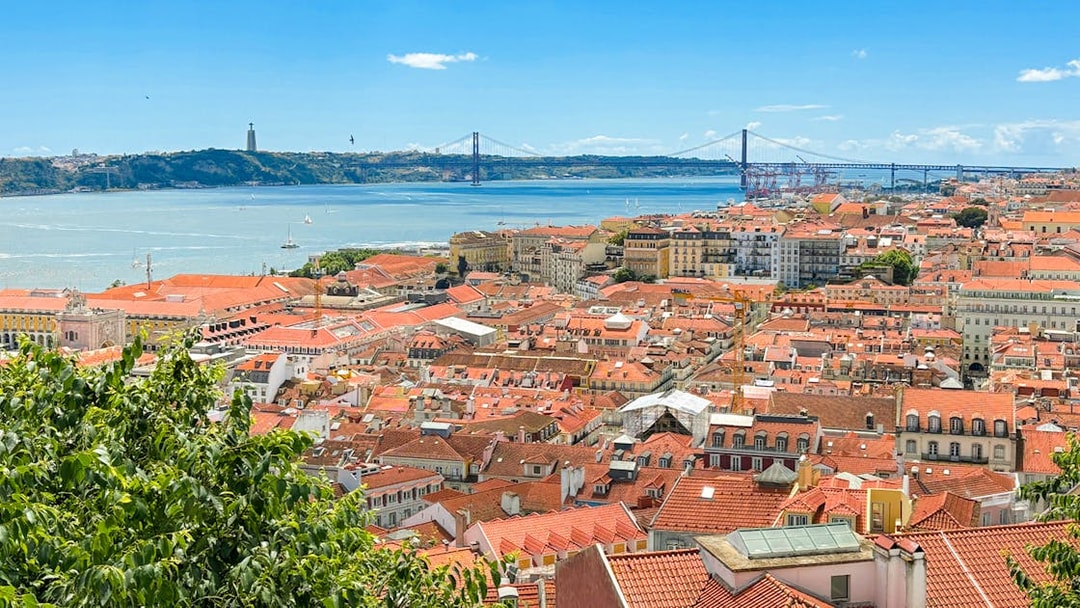 View of Lisbon rooftops and Tagus River from São Jorge Castle.
