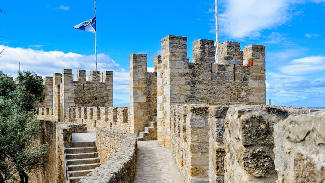 Walking path and stone towers of Castelo de Sao Jorge, Lisbon.