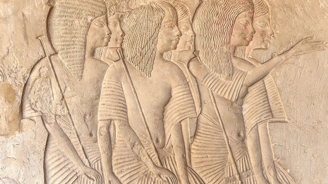 Wall reliefs depicting figures in Horemheb tomb, Saqqara, Giza.
