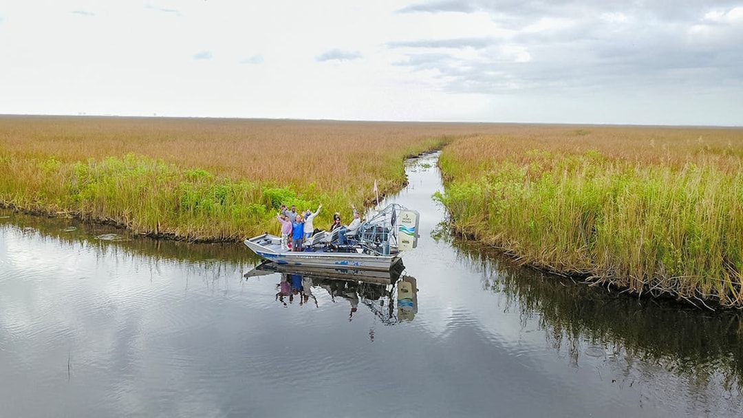 Airboat with tourists in Everglades at Sawgrass Recreation Park.