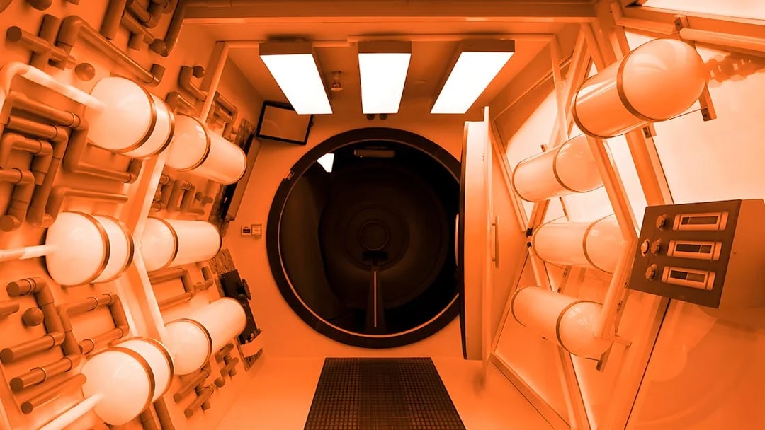 Futuristic exhibit at Science Centre Singapore featuring a tunnel with illuminated panels.