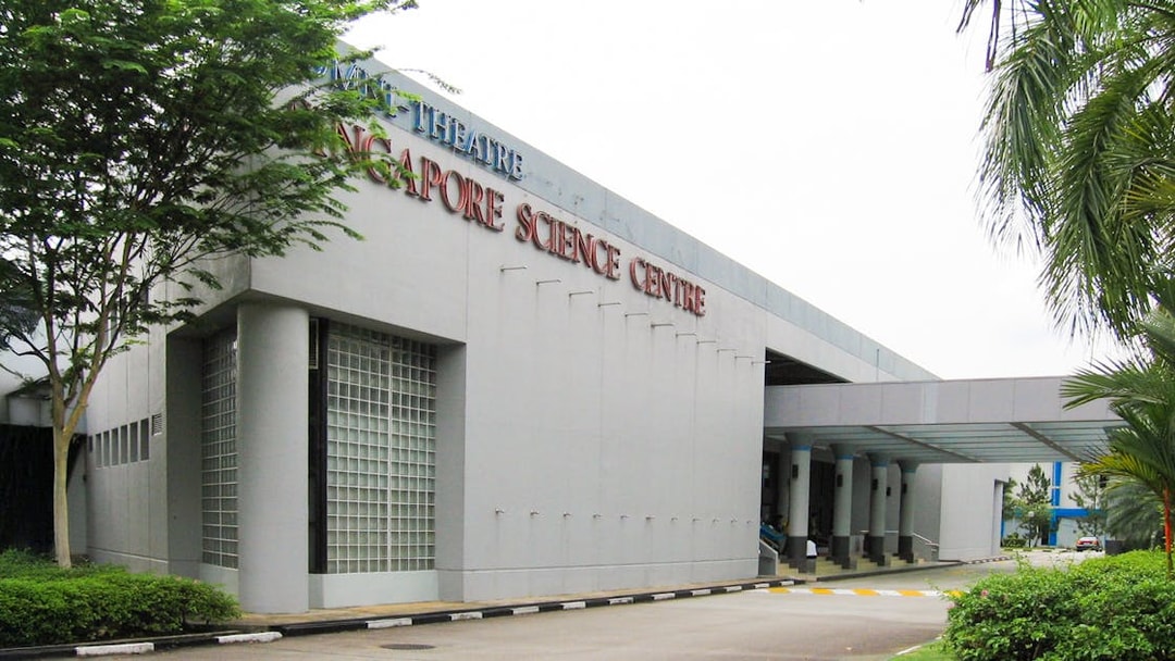 Singapore Science Centre entrance with surrounding greenery.