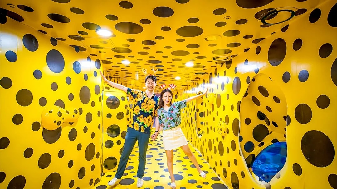 Visitors enjoying a polka dot room at SEA LIFE Busan Aquarium.