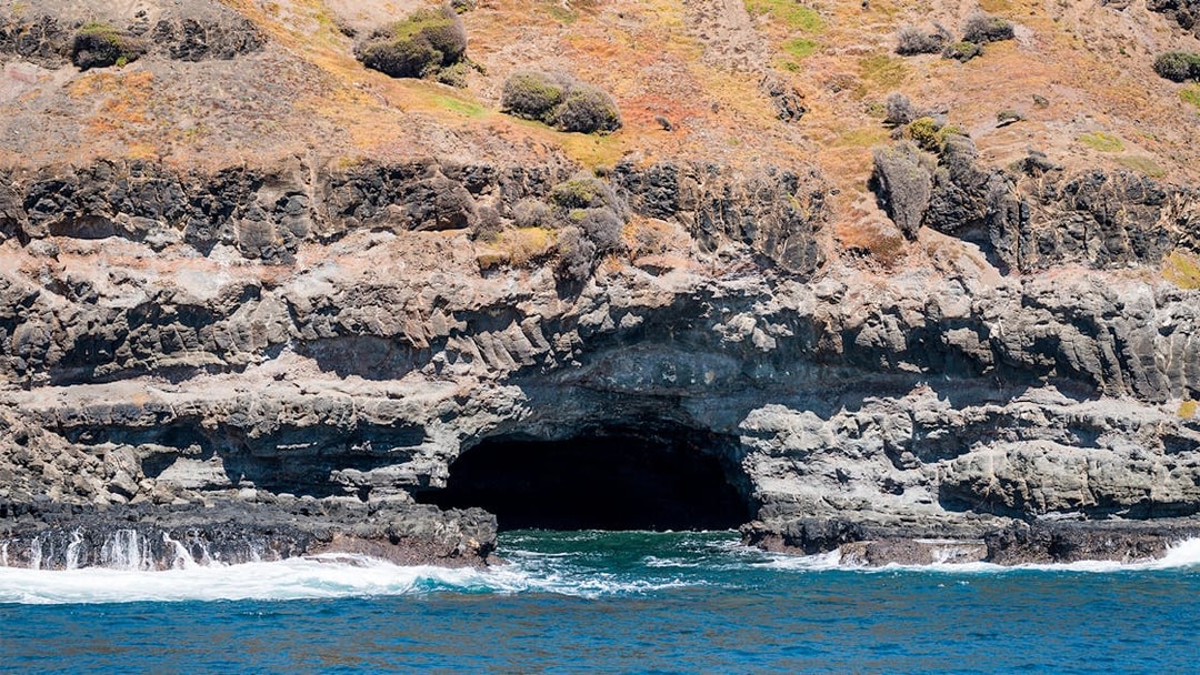 Rocky coastal cave at Phillip Island during seal watching cruise.