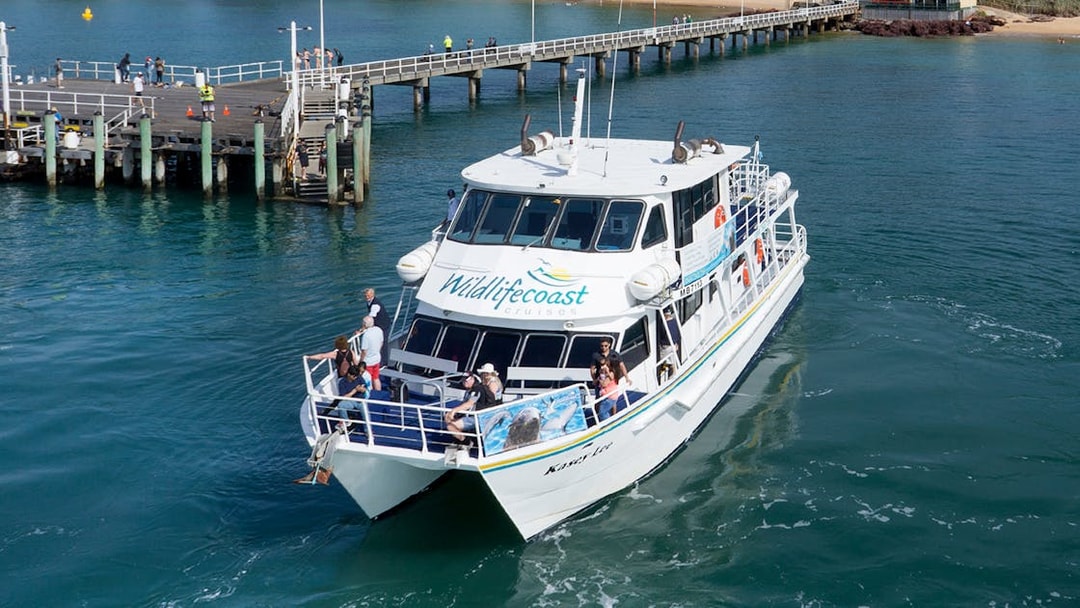 Cruise boat departing pier for seal watching at Phillip Island.