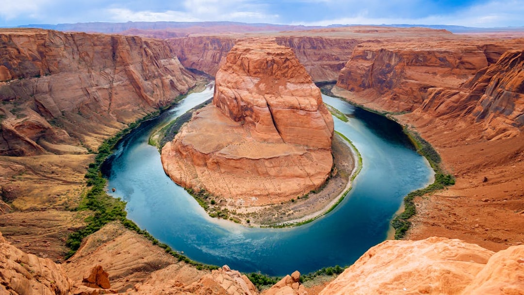 Horseshoe Bend view with Colorado River, part of Secret Antelope Canyon & Horseshoe Bend Tour.