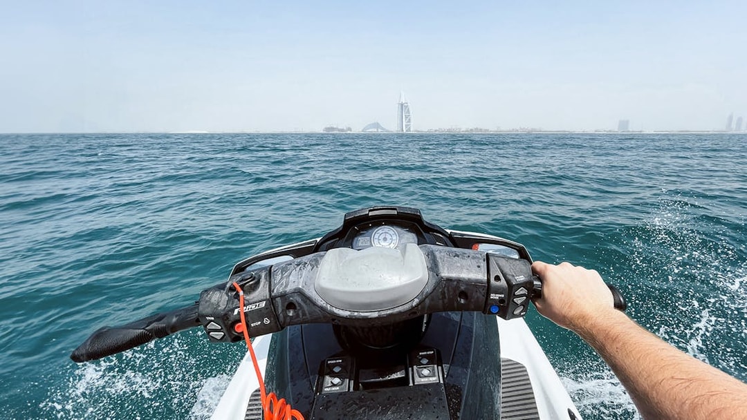 Jet ski ride with view of Burj Al Arab in Dubai.