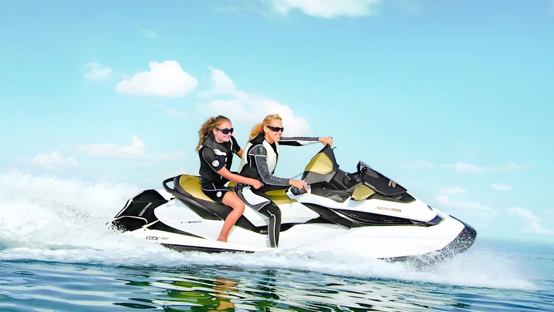 Jet ski ride on the waters of Dubai with two people enjoying the experience.