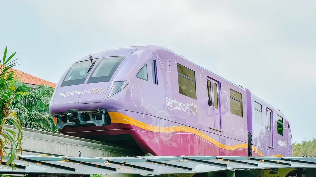 Purple monorail on track, Sentosa Island, Singapore.