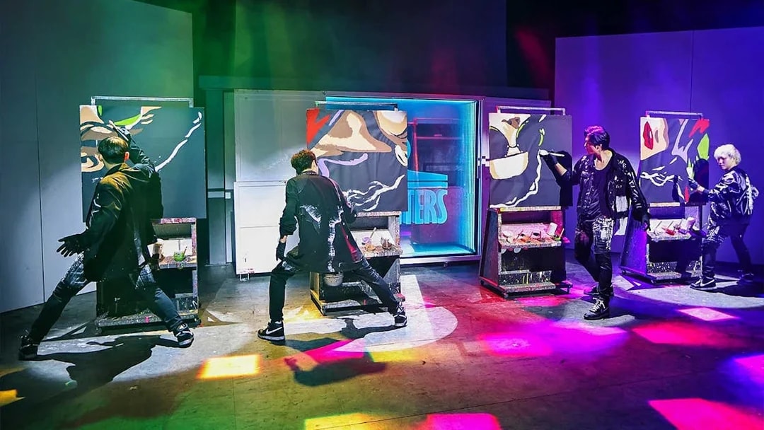 Performers painting on stage during a vibrant Painter Show in Gapyeong, South Korea.