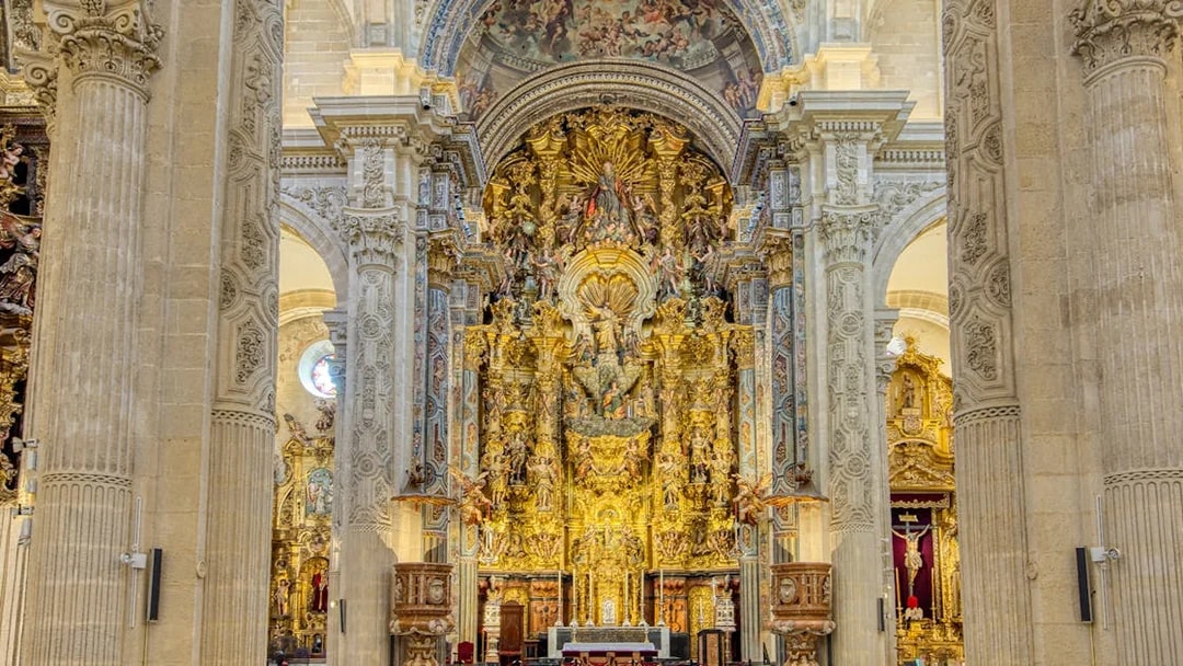 Seville Cathedral ornate altar with intricate carvings and golden details.
