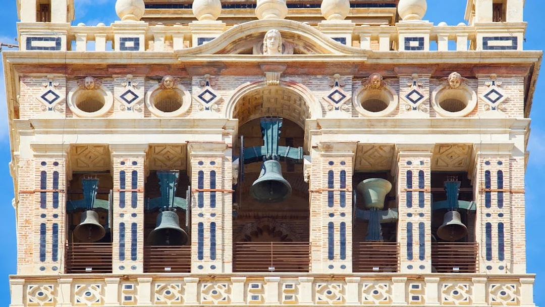 Bells in the belfry section of The Giralda tower, Seville, Spain.