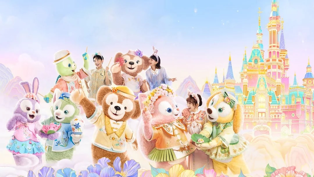 Characters and visitors in front of Enchanted Storybook Castle at Shanghai Disney.