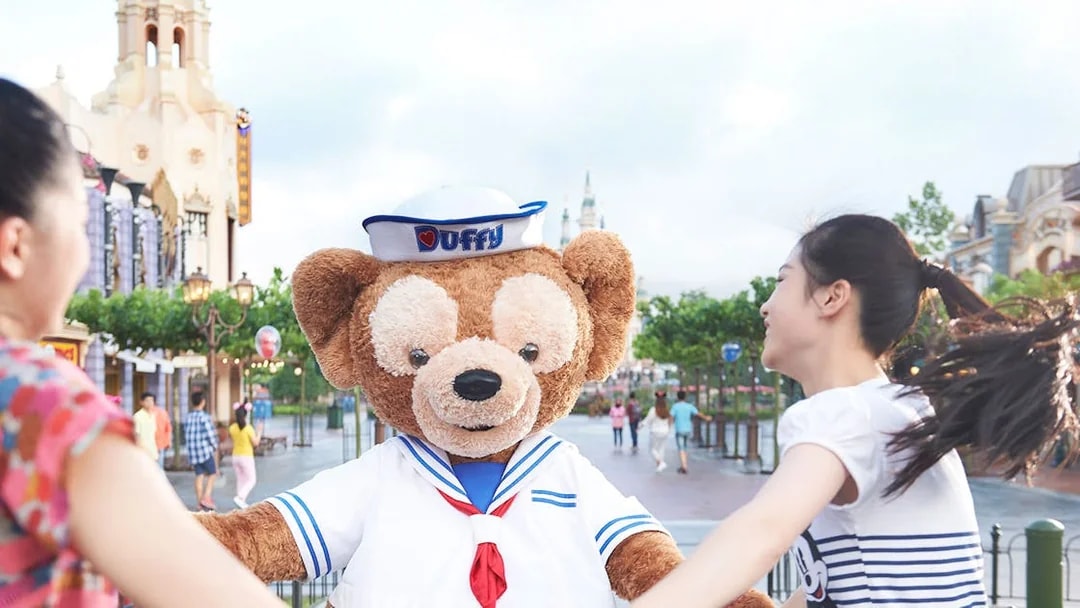 Duffy bear character greeting visitors at Shanghai Disneyland.