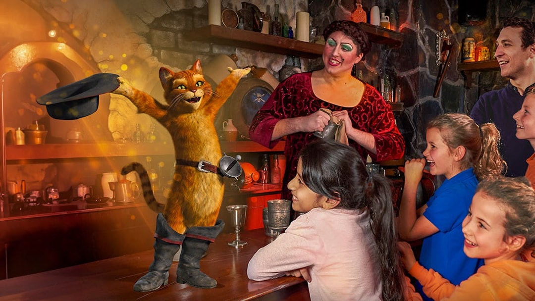 Puss in Boots entertaining children at Shrek’s Adventure! London.