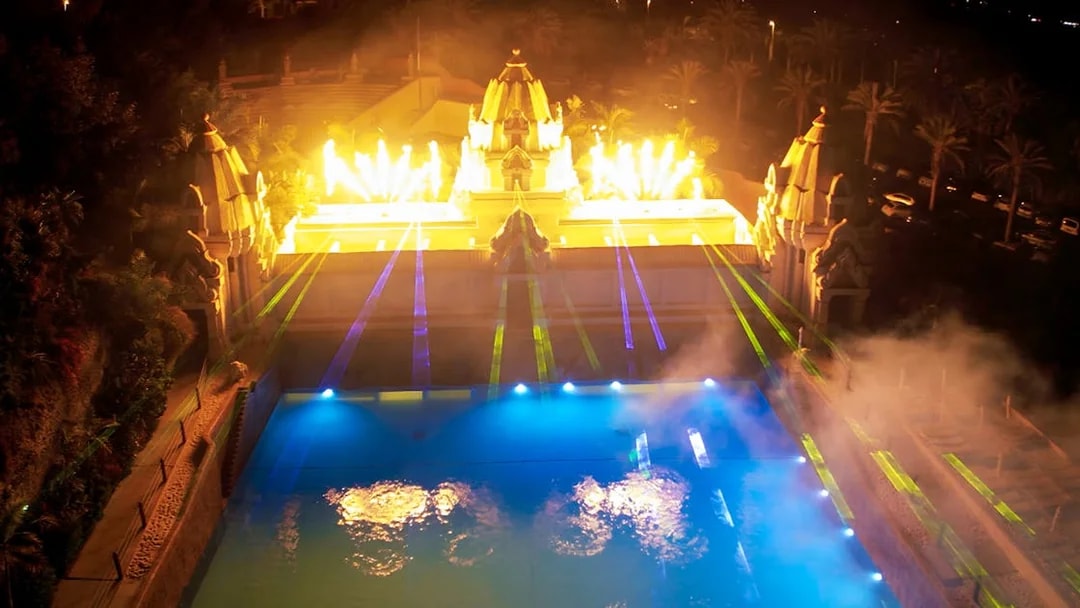 Siam Park night show with lights and water display.