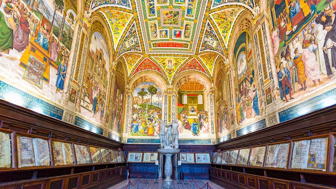 Siena Cathedral interior with vibrant frescoes and detailed architecture on the Gates of Heaven tour.