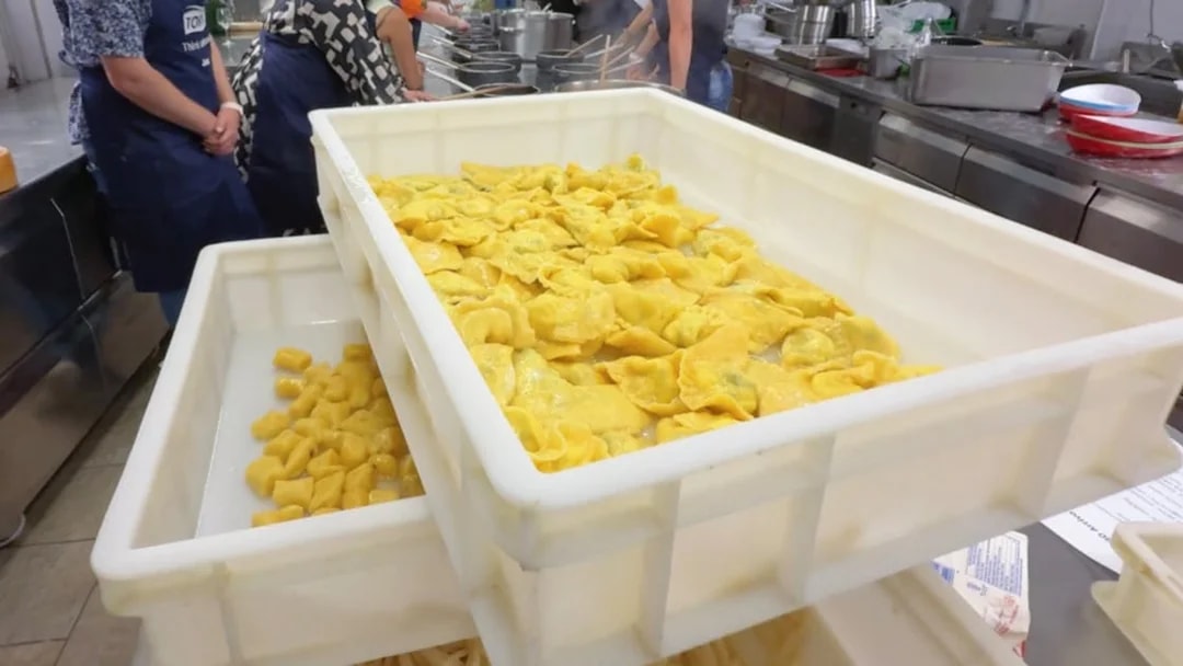 Fresh pasta drying during a cooking class in Siena kitchen.