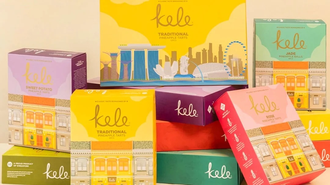 Kele pineapple tart boxes with Singapore skyline illustration.
