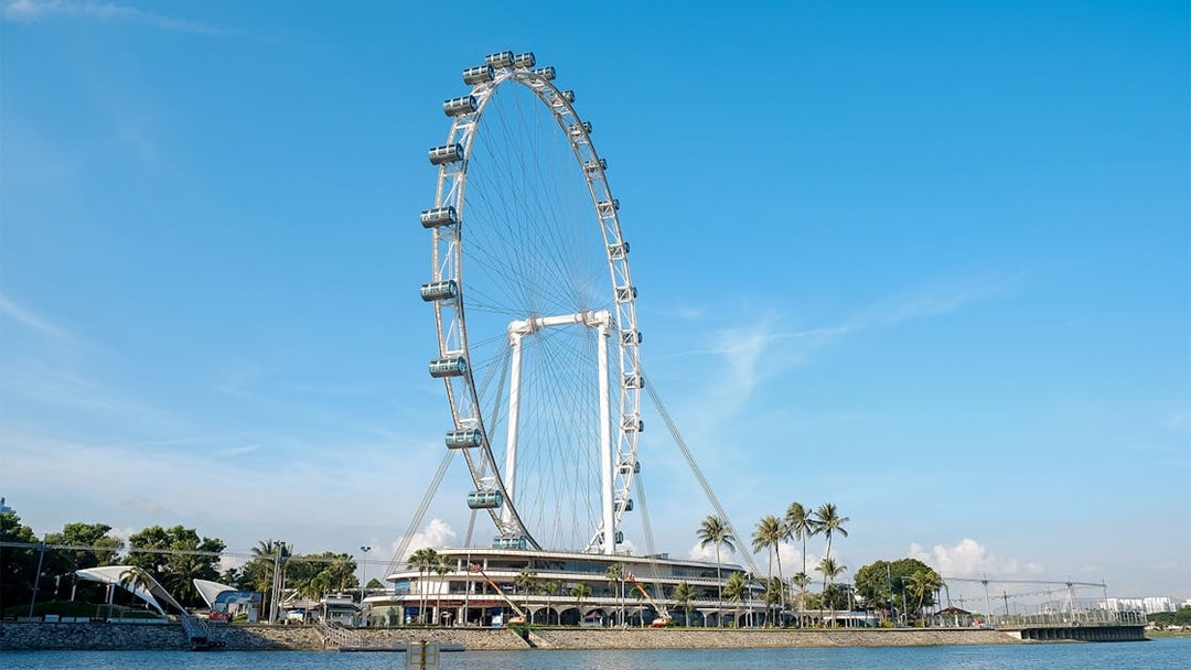 Singapore Flyer against blue sky during The Original DUCKtours Singapore.