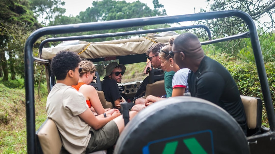 Jeep safari group exploring Sintra's lush landscape on a guided tour.