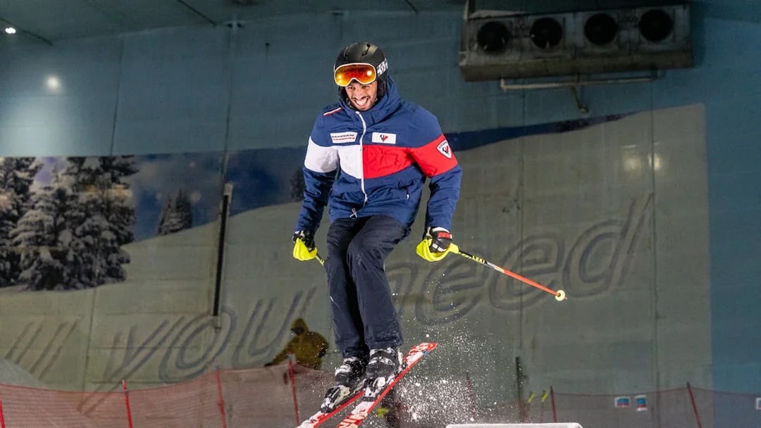 Man skiing indoors at Ski Dubai Slope.