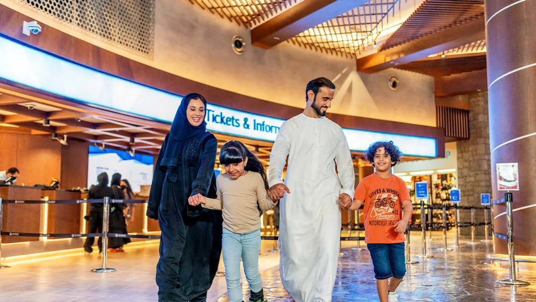 Family enjoying time at Ski Dubai Snow Park entrance.