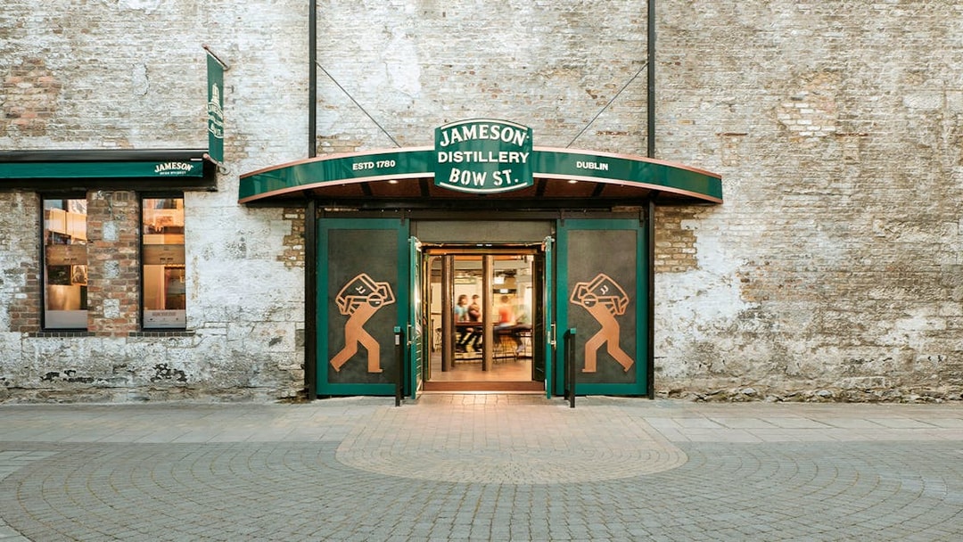 Jameson Distillery Bow St. entrance in Dublin with visitors entering for a guided tour.