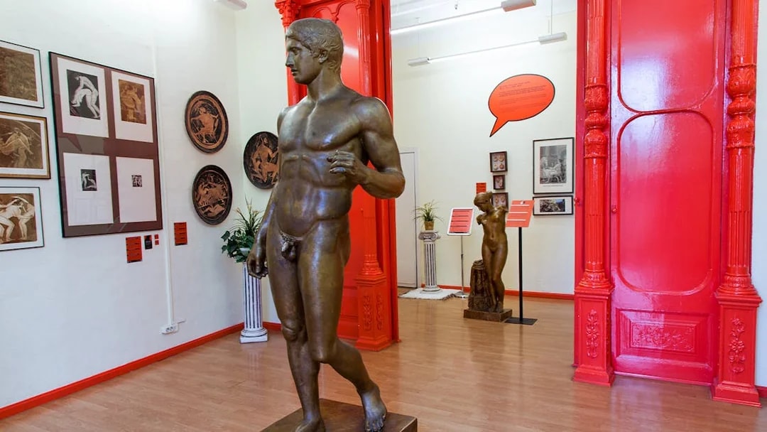 Statues and artwork inside the Erotic Museum Barcelona exhibit room.