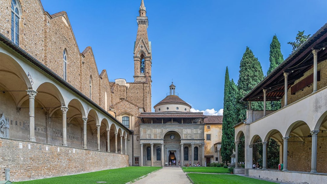 Pazzi Chapel courtyard with arched colonnades and central dome in Florence, Italy.